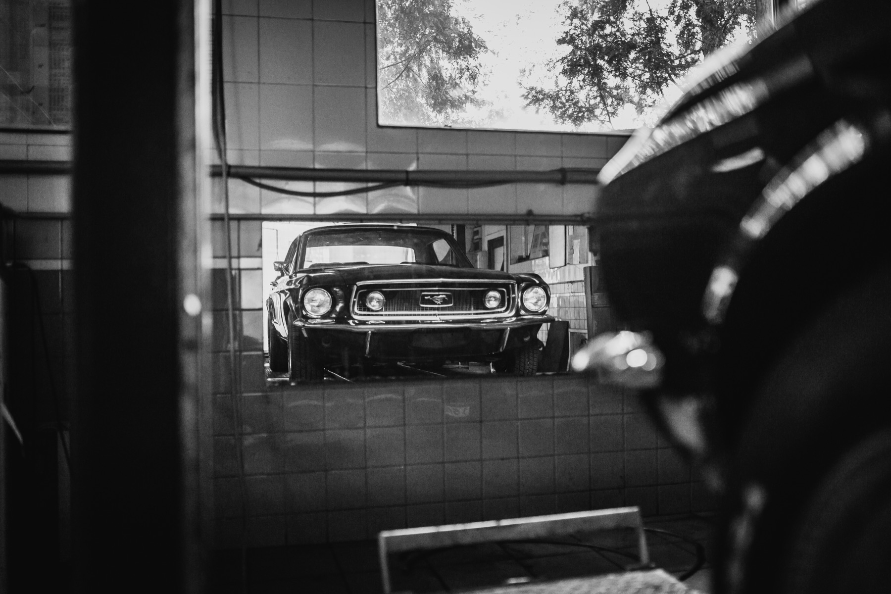 Classic car inside an automotive workshop